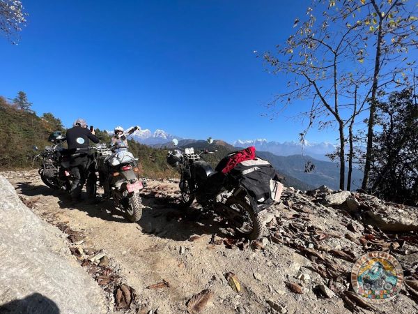 Motorcyclist riding through Nepalese Himalayas on Everest Motorbike Tour